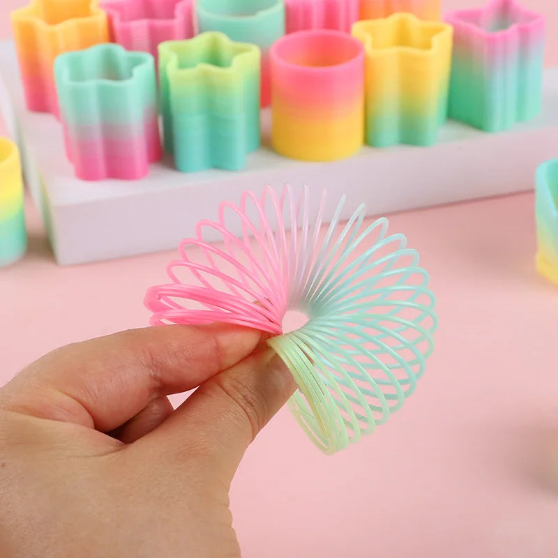 Rainbow Magic Spring Toys – 12 or 24 Pcs Mini Slinky Party Favors for Kids