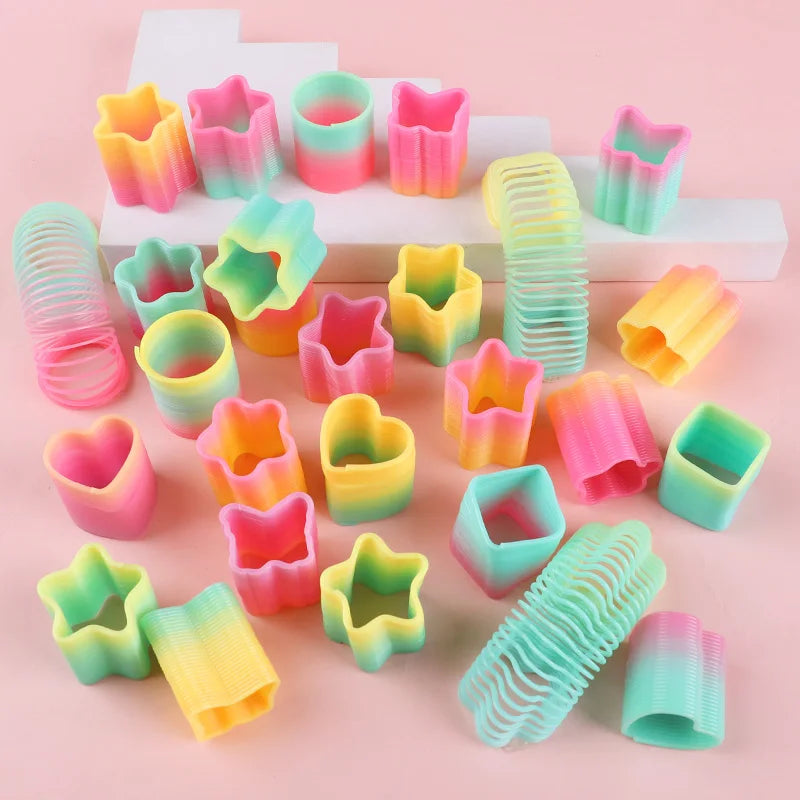 Rainbow Magic Spring Toys – 12 or 24 Pcs Mini Slinky Party Favors for Kids