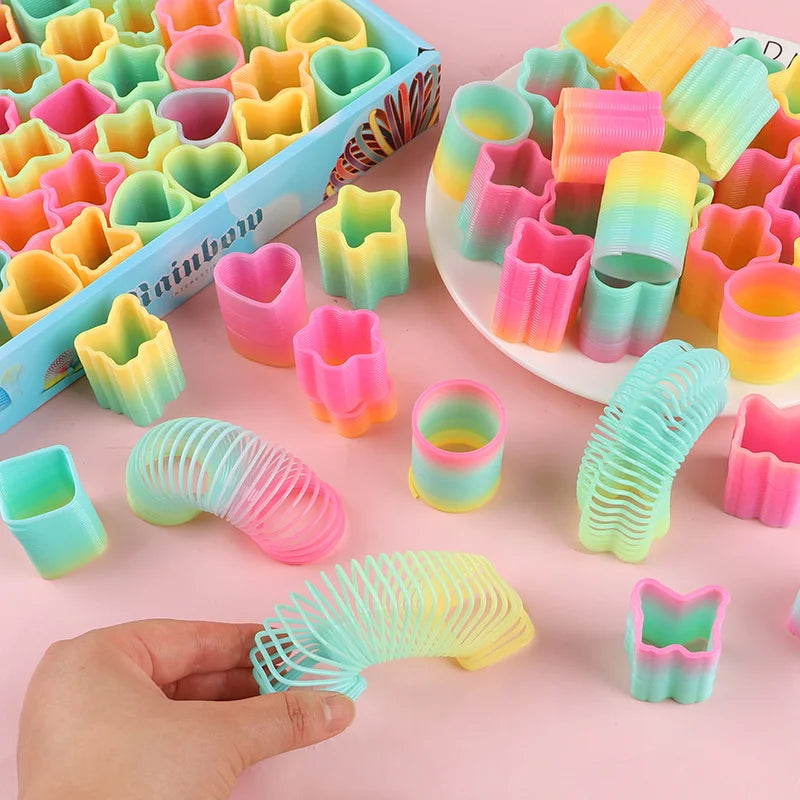 Rainbow Magic Spring Toys – 12 or 24 Pcs Mini Slinky Party Favors for Kids