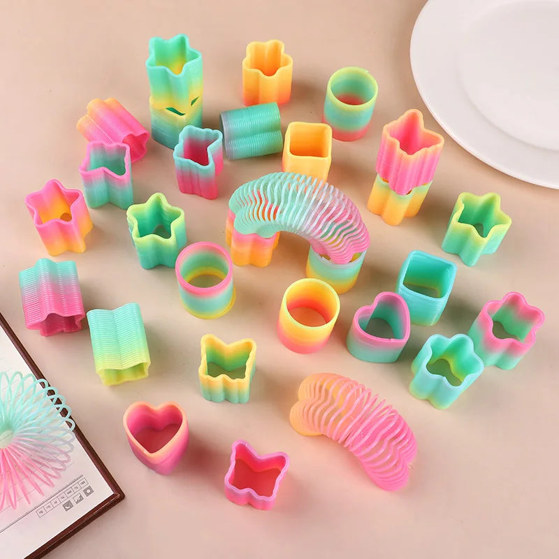 Rainbow Magic Spring Toys – 12 or 24 Pcs Mini Slinky Party Favors for Kids